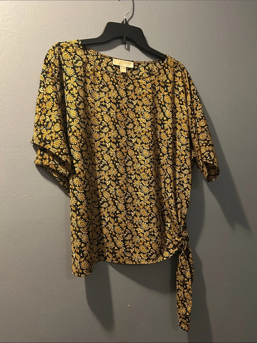 Michael Kors Black Top with Gold Floral Print and Side Tie
